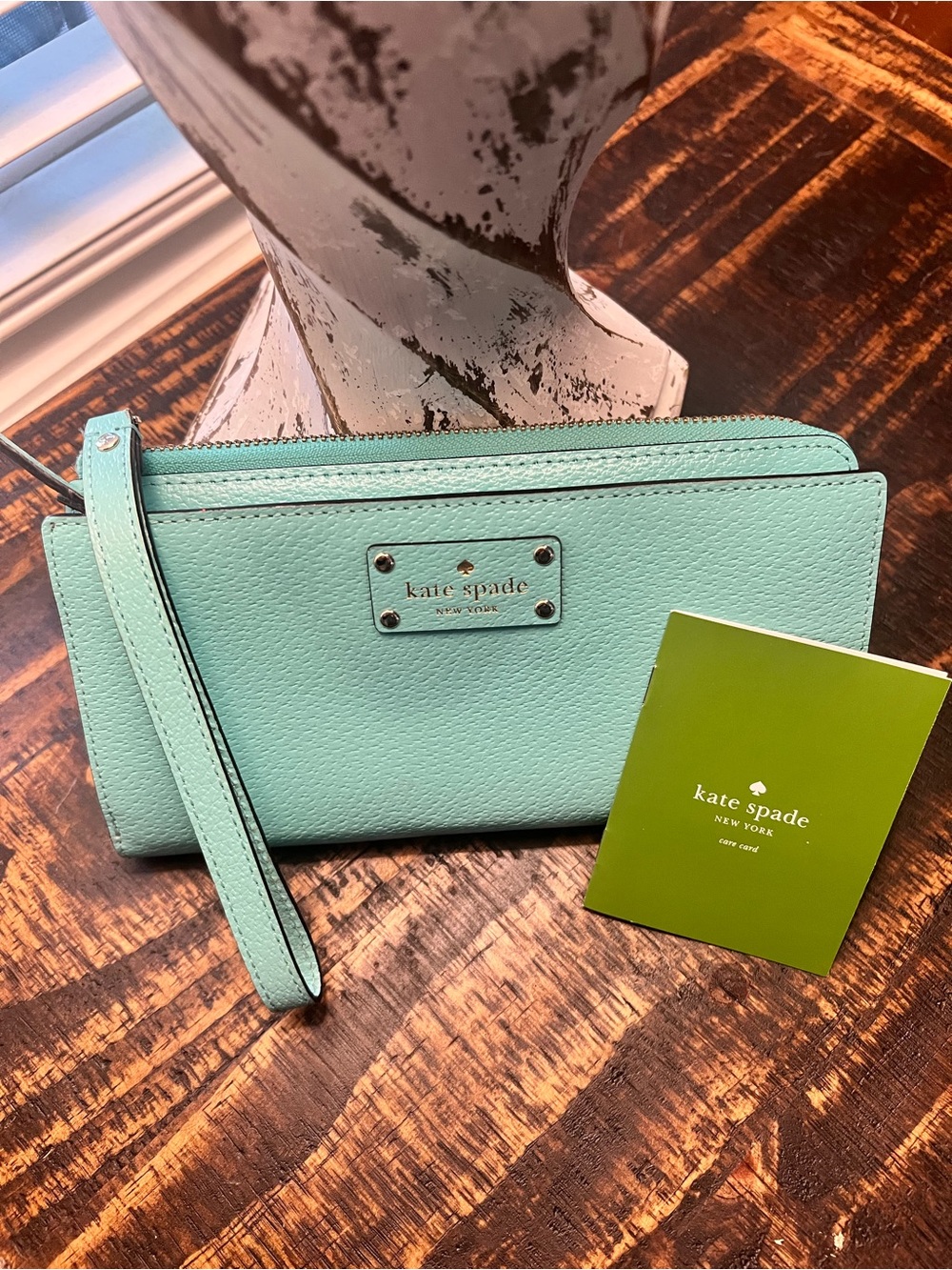 kate spade Turquoise pebble leather wristlet clutch